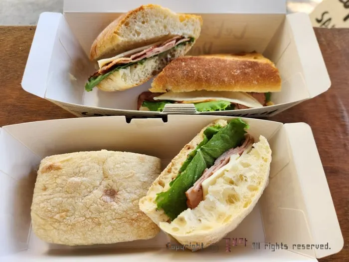 Baguette sandwich with house-made ham and cheese