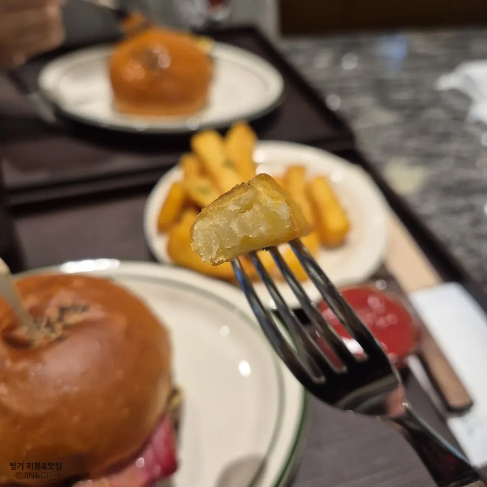 Cross-section of the Bacon Cheeseburger showing hanwoo patty