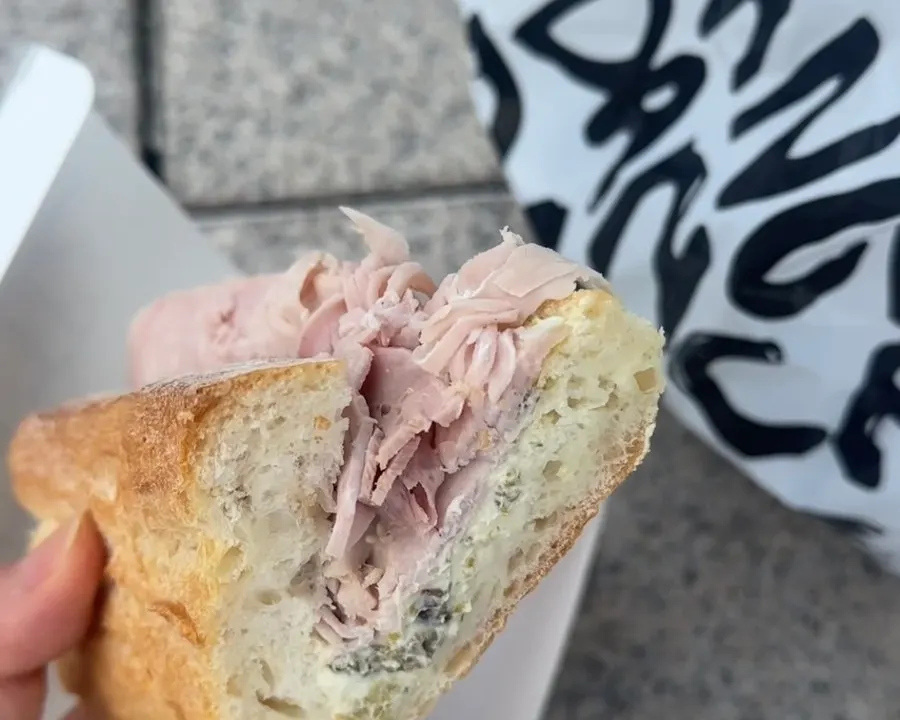 Close-up of a sandwich with a bite taken out