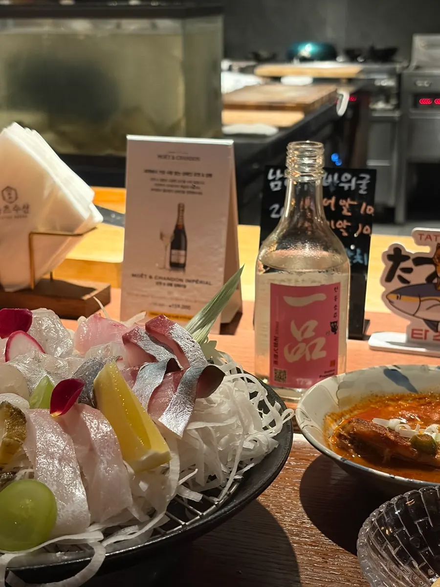 Table with shrimp tempura and side dishes