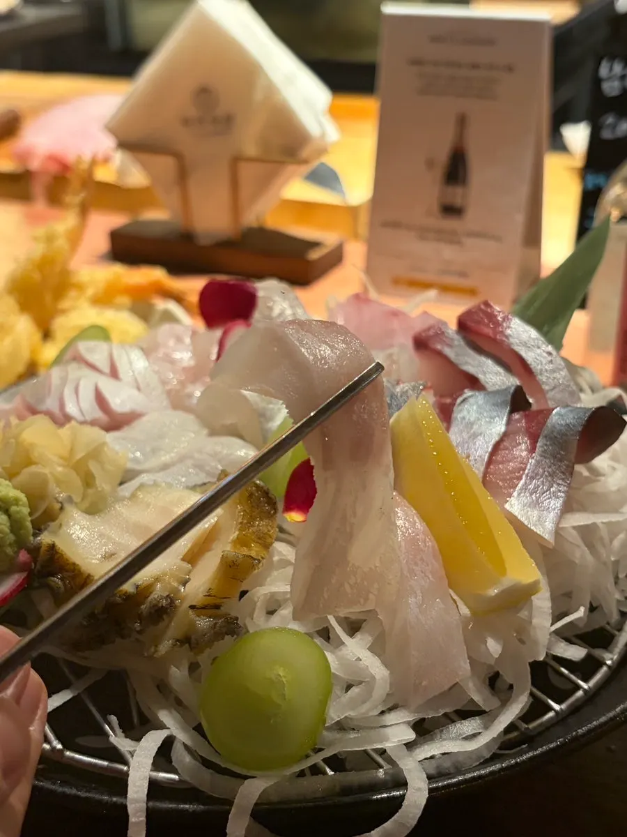 Close-up of a single piece of aged sashimi