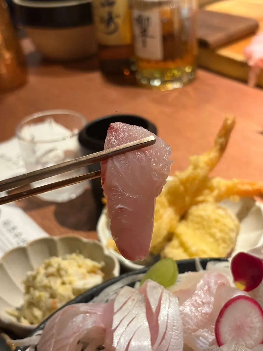 Close-up shot of aged sashimi at TATSU SUSAN