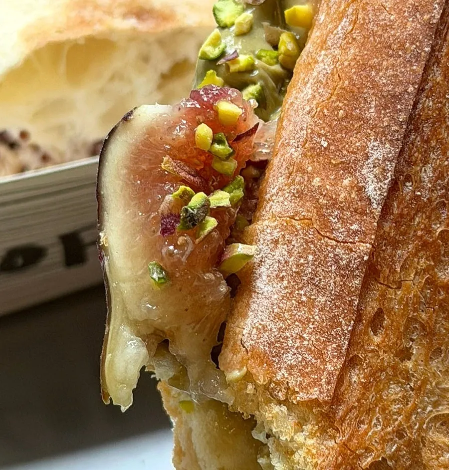 Inside of baguette with fig jam packed in