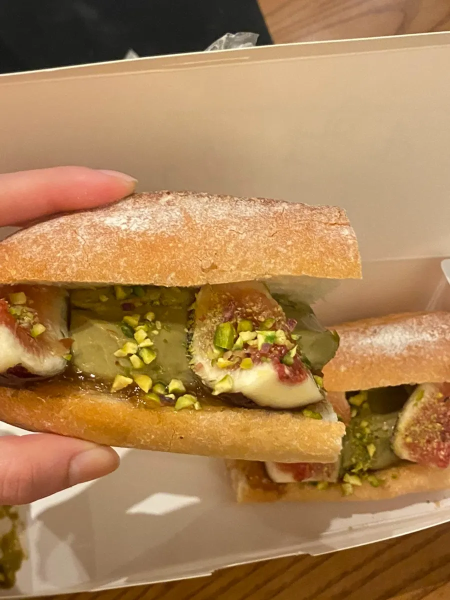 A bite taken out of the tofu cream baguette
