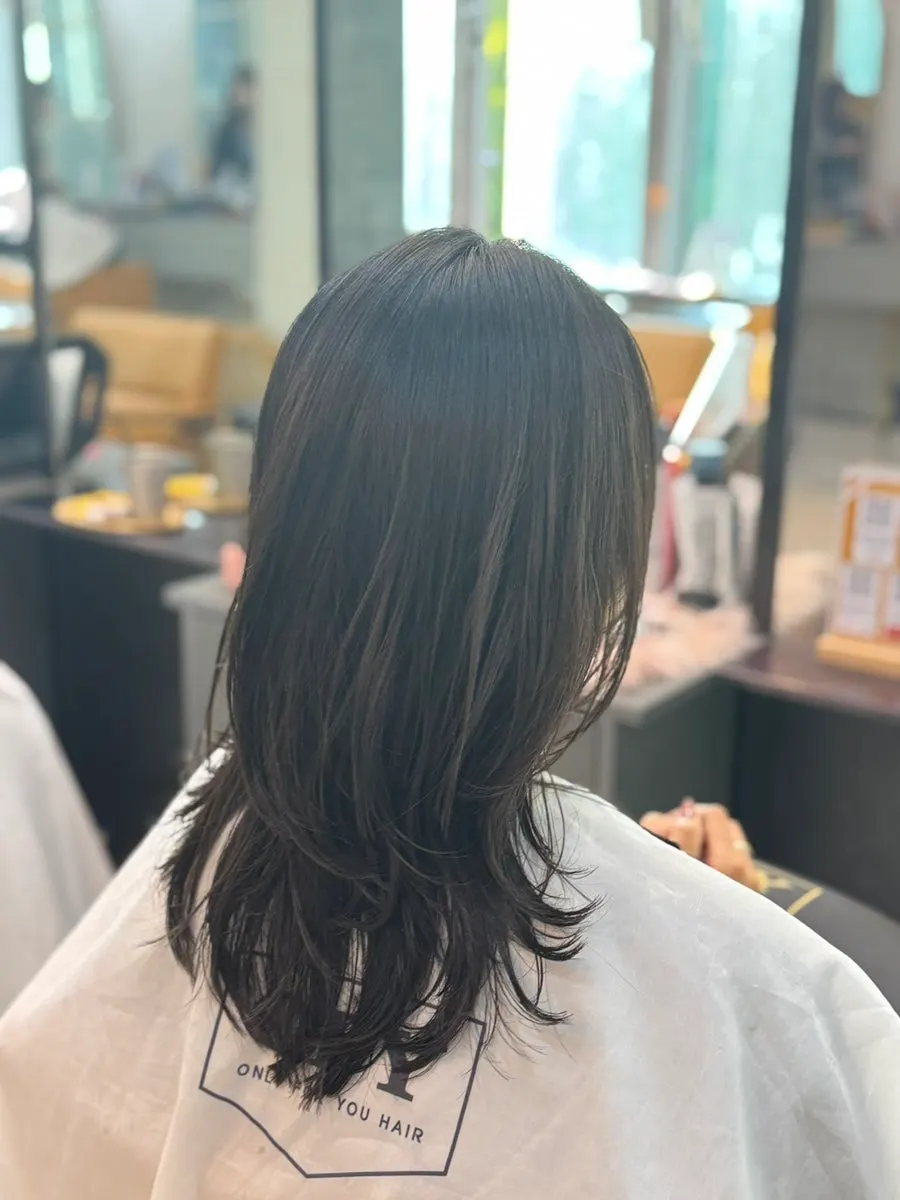The completed medium-length layered perm