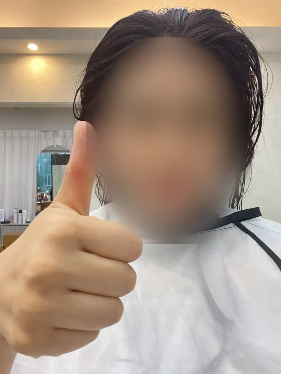 Checking hair condition after shampoo