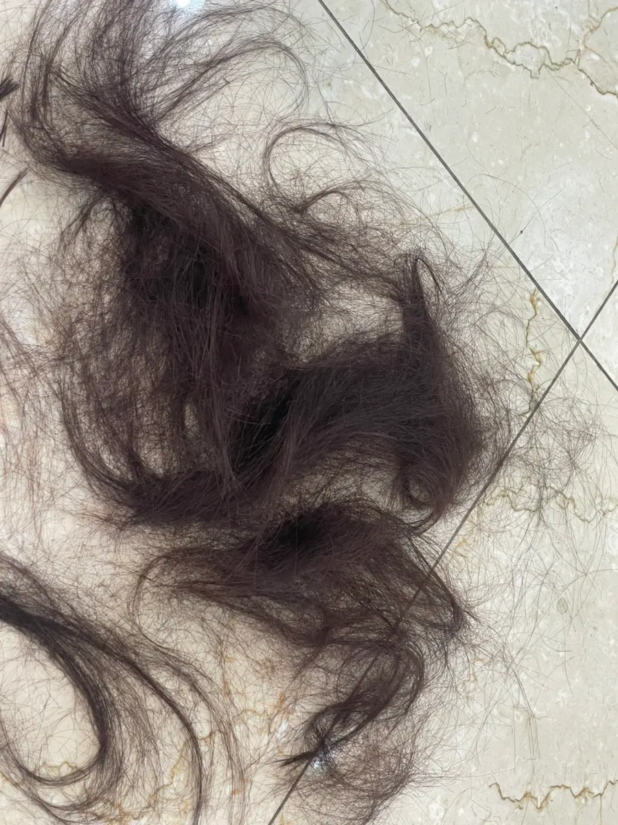Floor covered with cut hair
