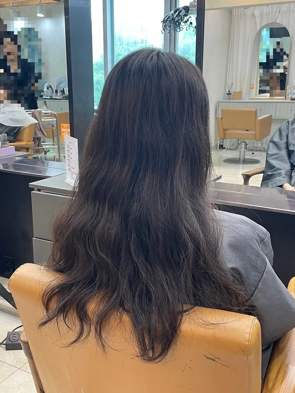 Hair before the service, still showing leftover perm texture