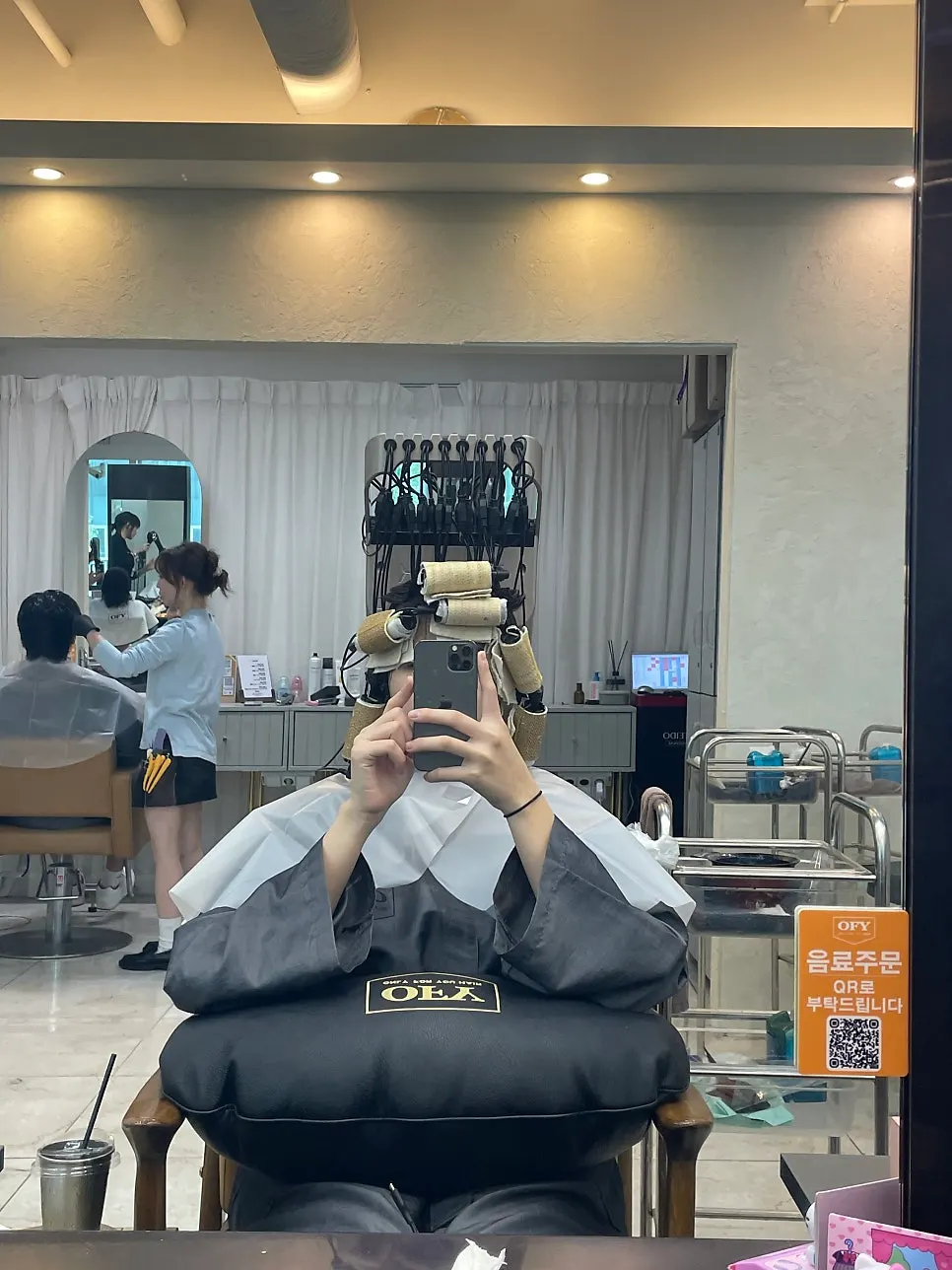 Prepping hair before the perm