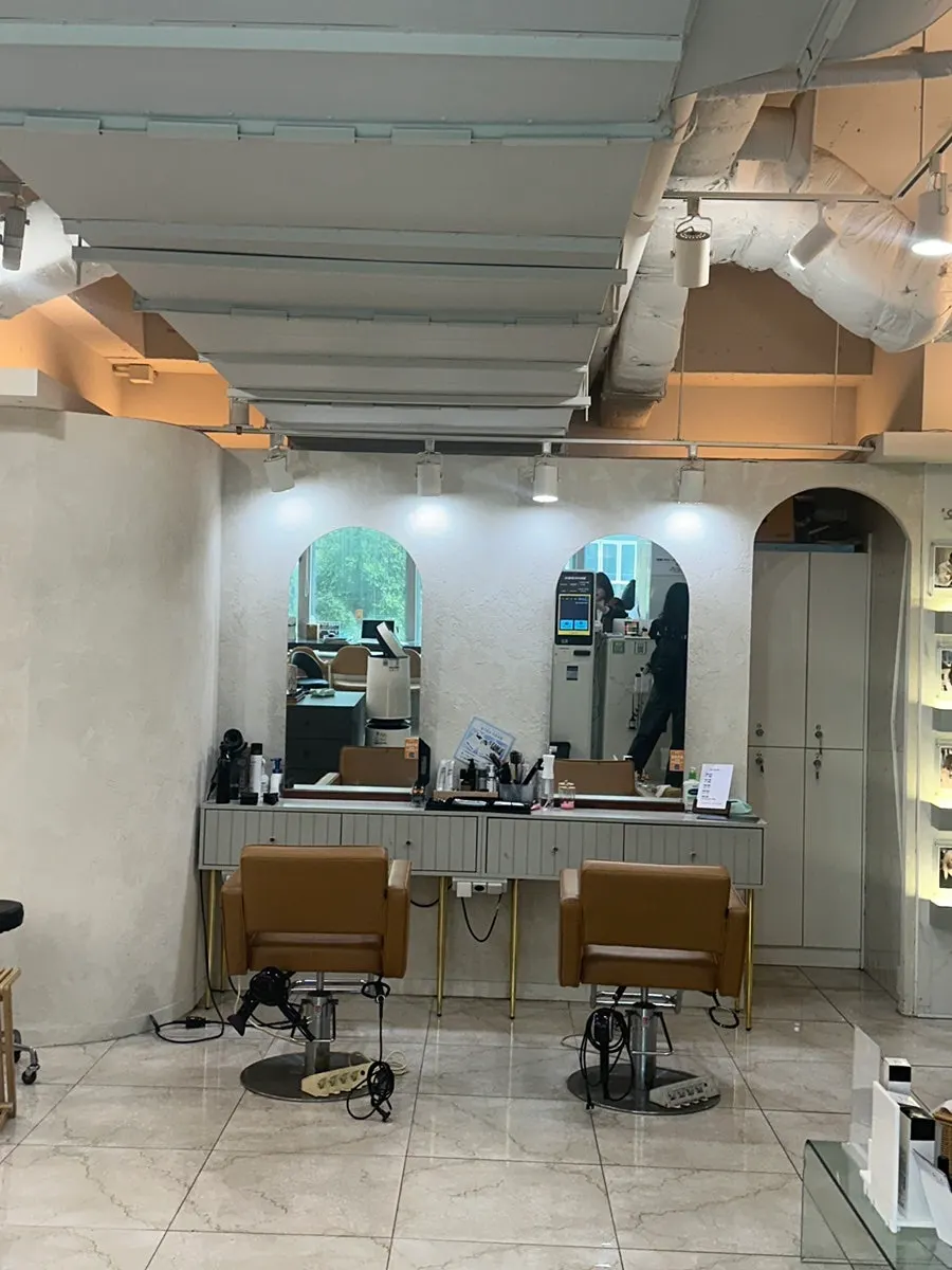 Row of hair service seats in the salon