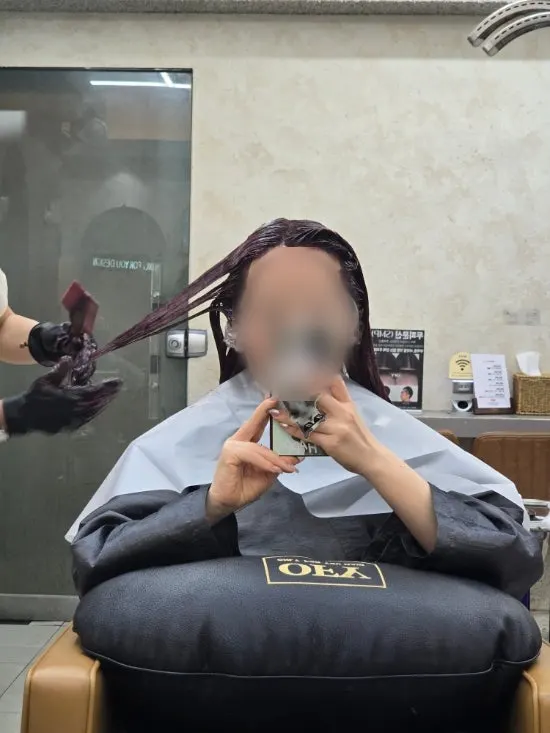 Hair with vivid red dye applied