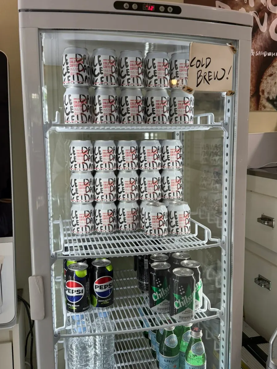 Canned cold brew and sodas on display
