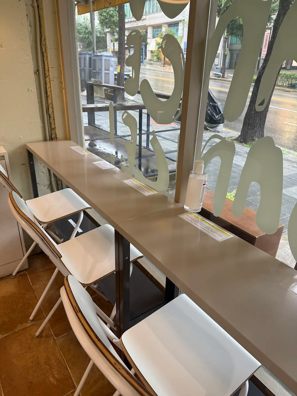 Narrow interior where sandwiches and coffee are made