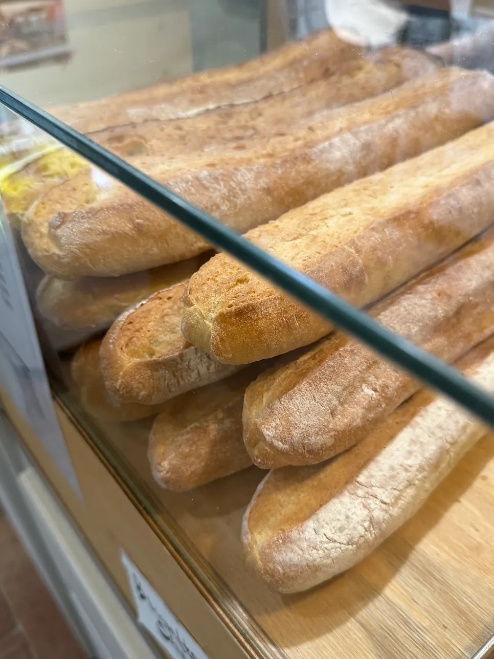 Display of baguettes, scones and other bread items