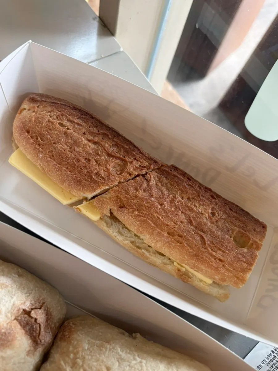 A piece of the honey butter baguette