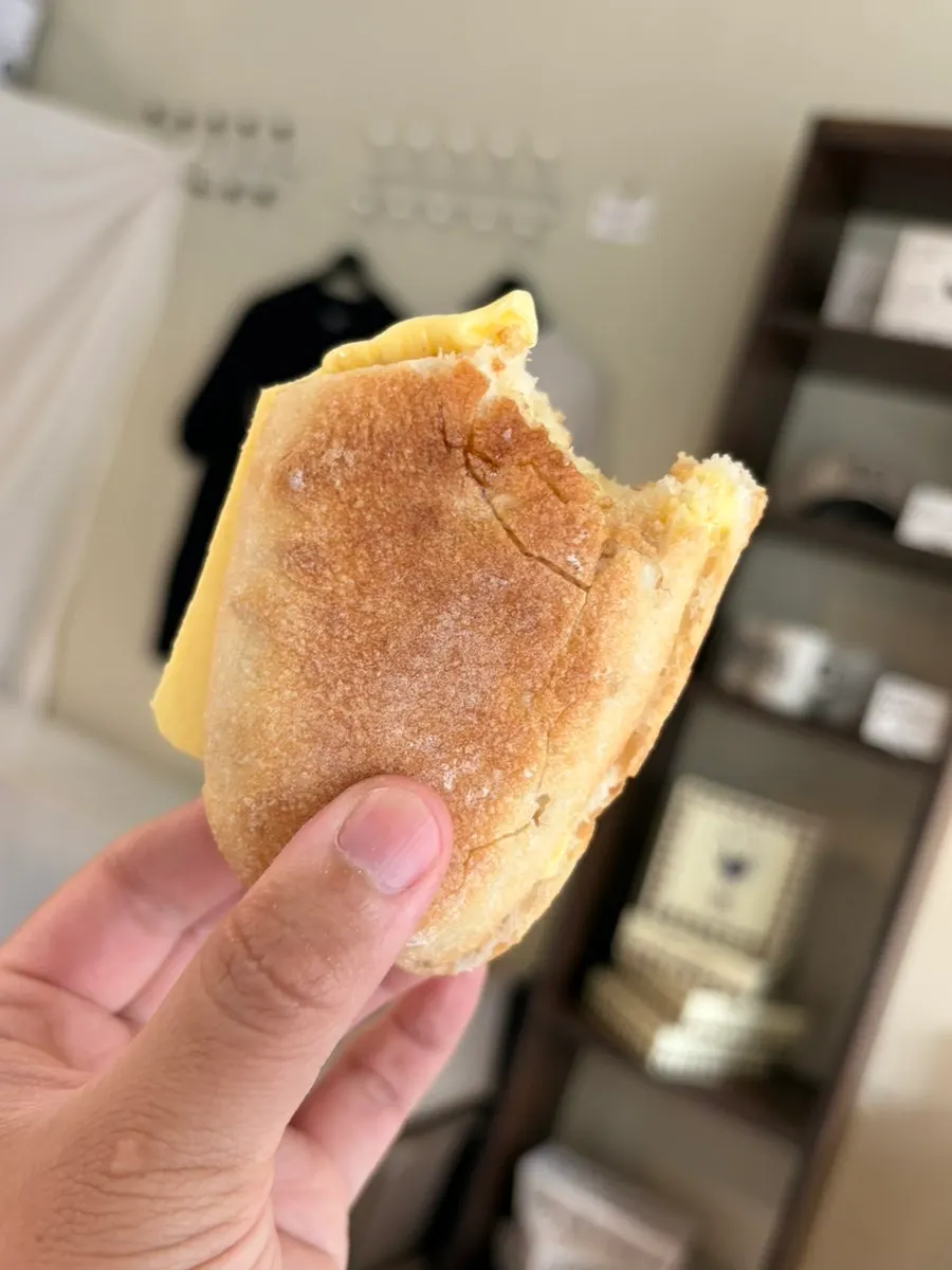 A bite taken out of the honey butter baguette