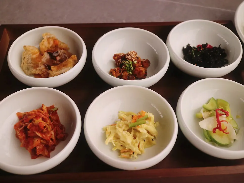 Fried mushroom sweet-and-sour bites and seasoned namul side dishes