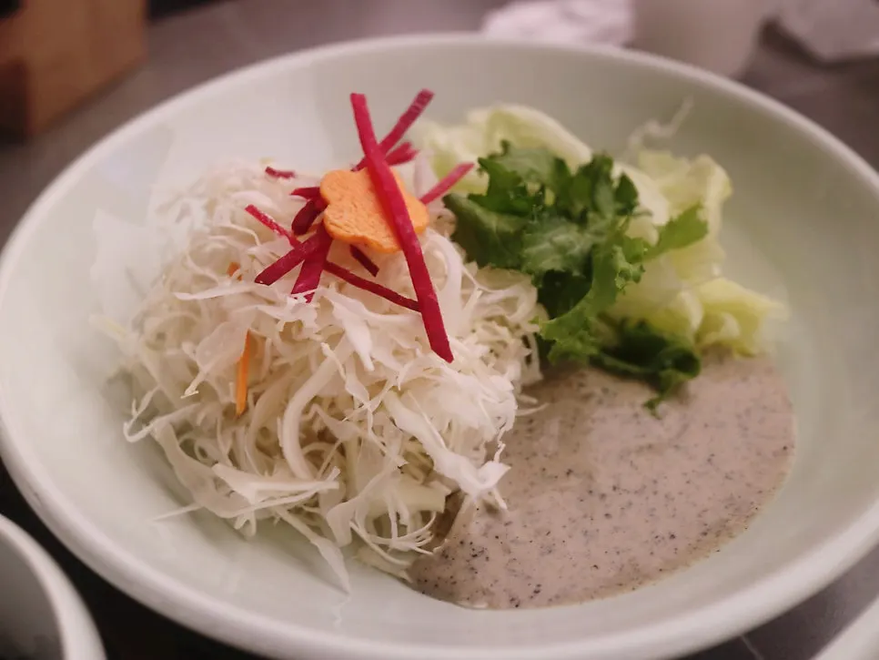 Japchae and salad side dishes
