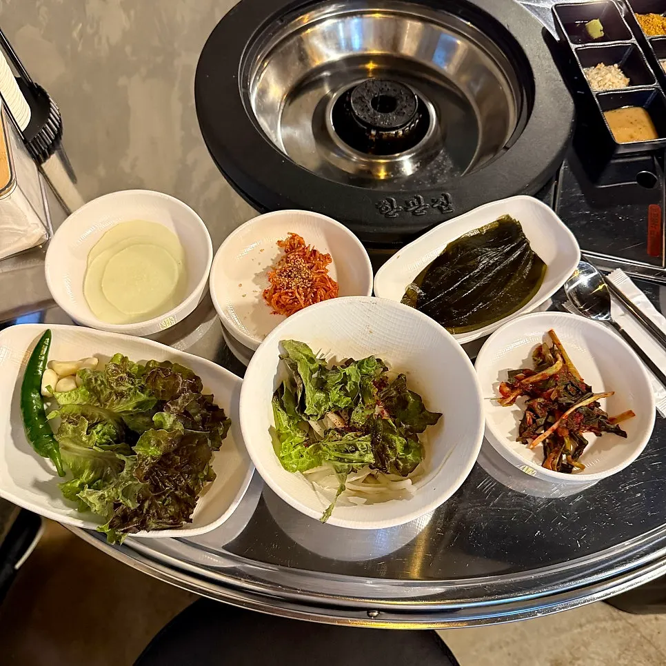 Table set with side dishes and six kinds of sauce
