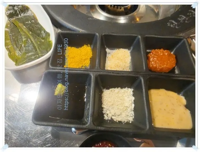 Table set with sauce tray and side dishes