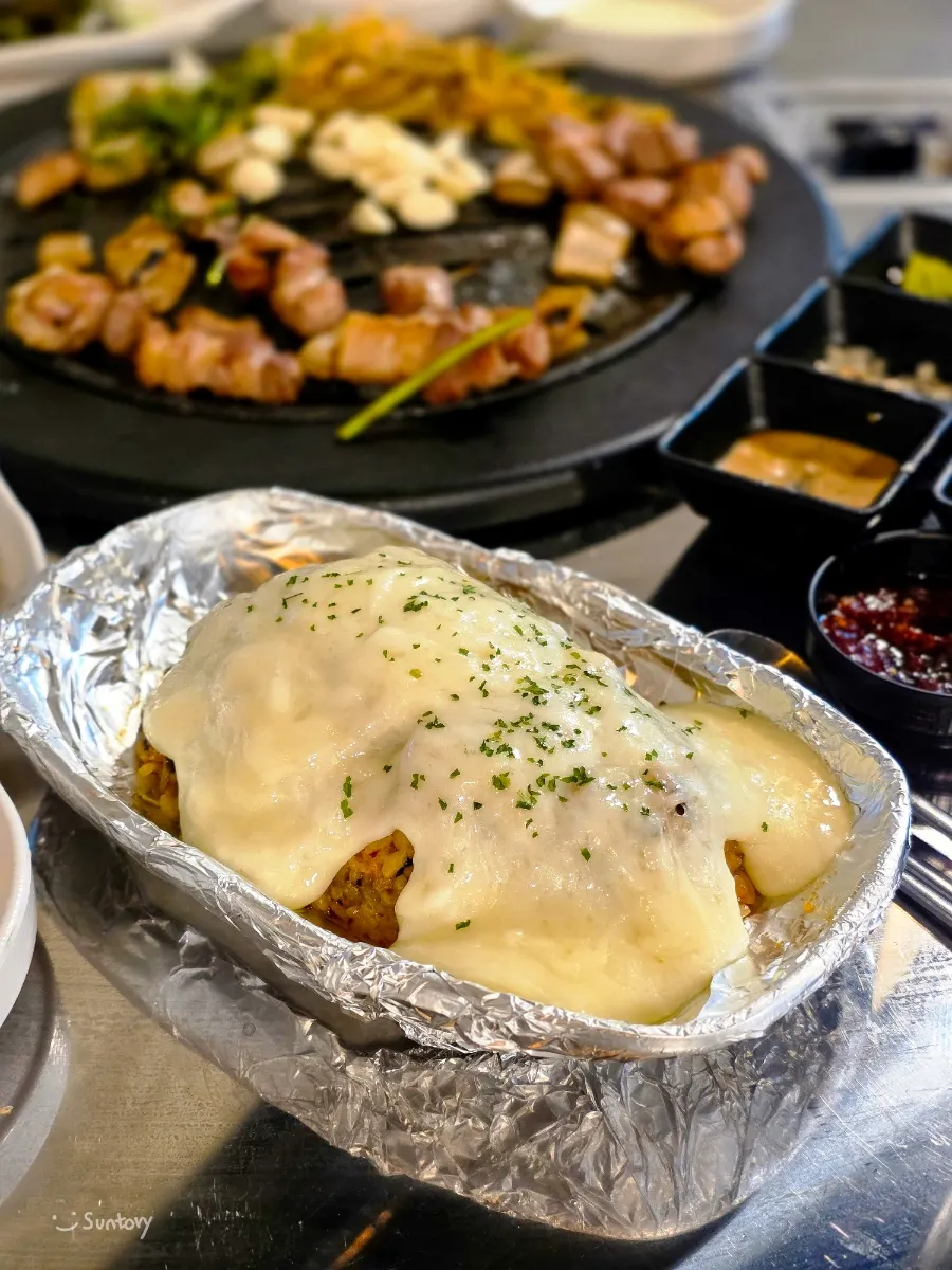 Kimchi cheese fried rice piled high with cheese