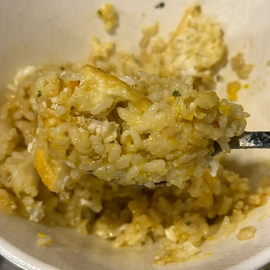 Mixing Hanpanjip's butter soy sauce egg rice