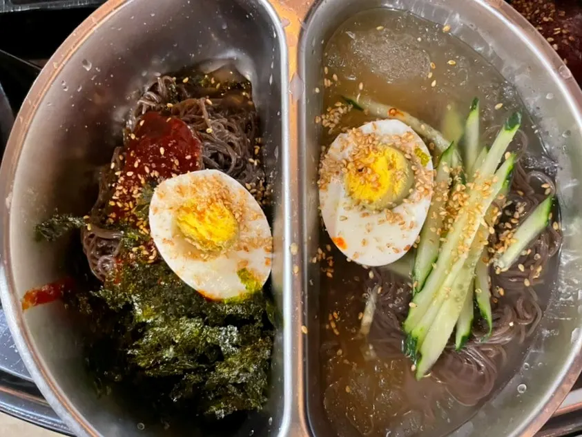 Half-and-half naengmyeon with half water noodles, half spicy bibim noodles