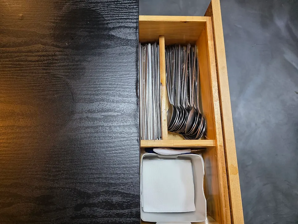 Spoons and chopsticks set on the table