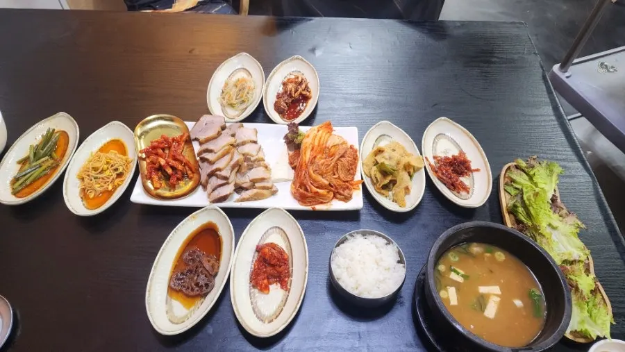 Rice served alongside the 27-dish side dish spread