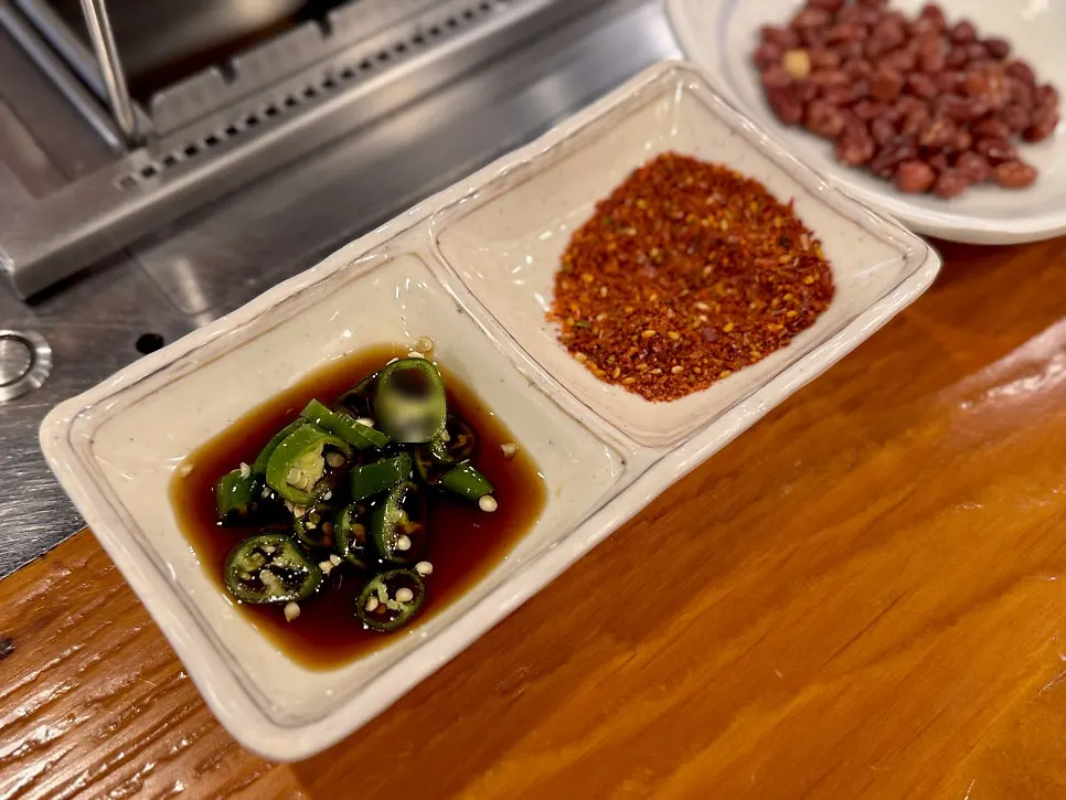 Basic sauce setup with soy sauce and cumin salt