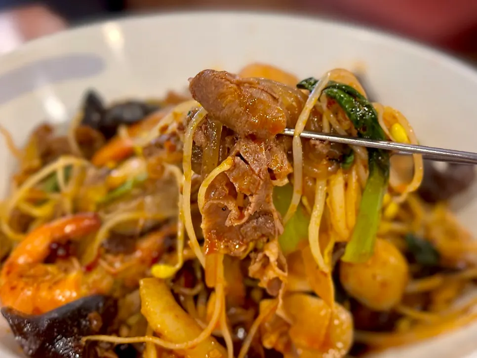 Close-up of mala xiangguo showing beef and shrimp