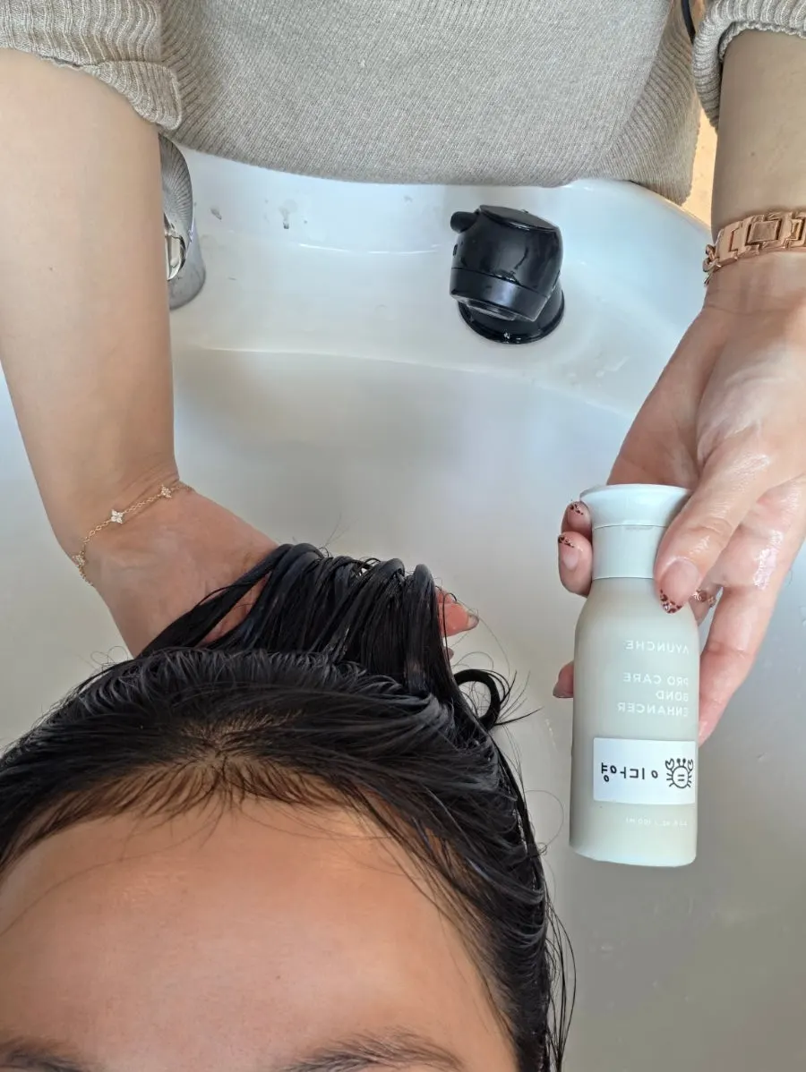 Applying clinic product to the hair
