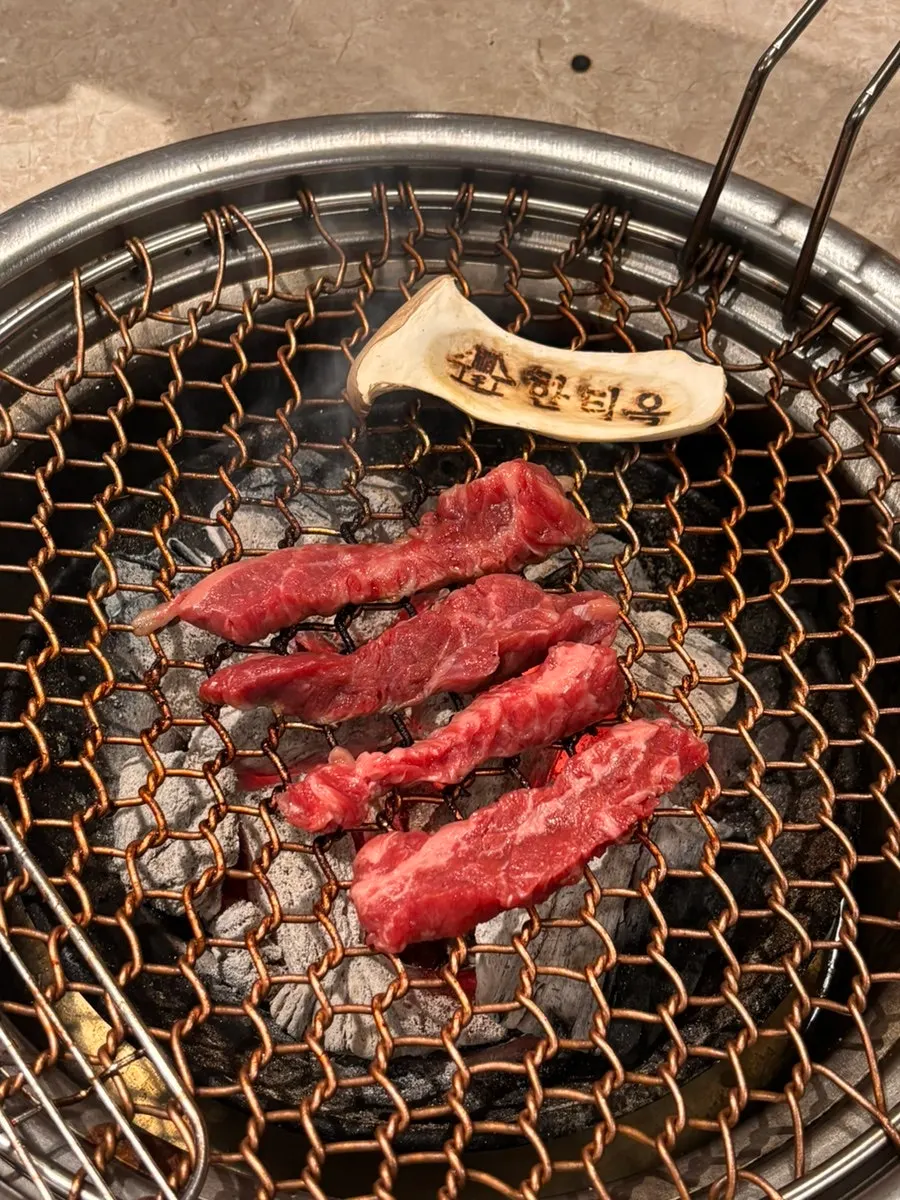 Full table of meat and side dishes at Hantiok in Bangi-dong