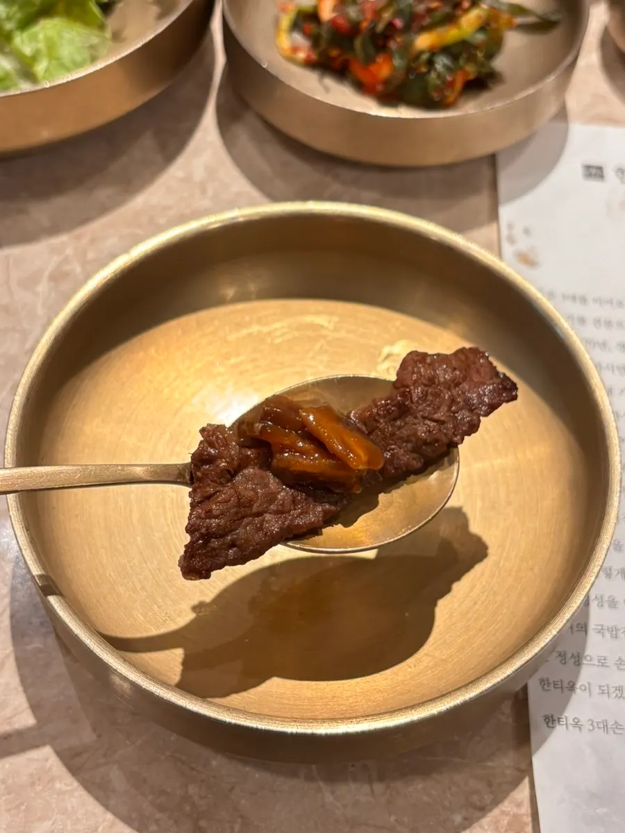 Close-up bite of beef rib meat