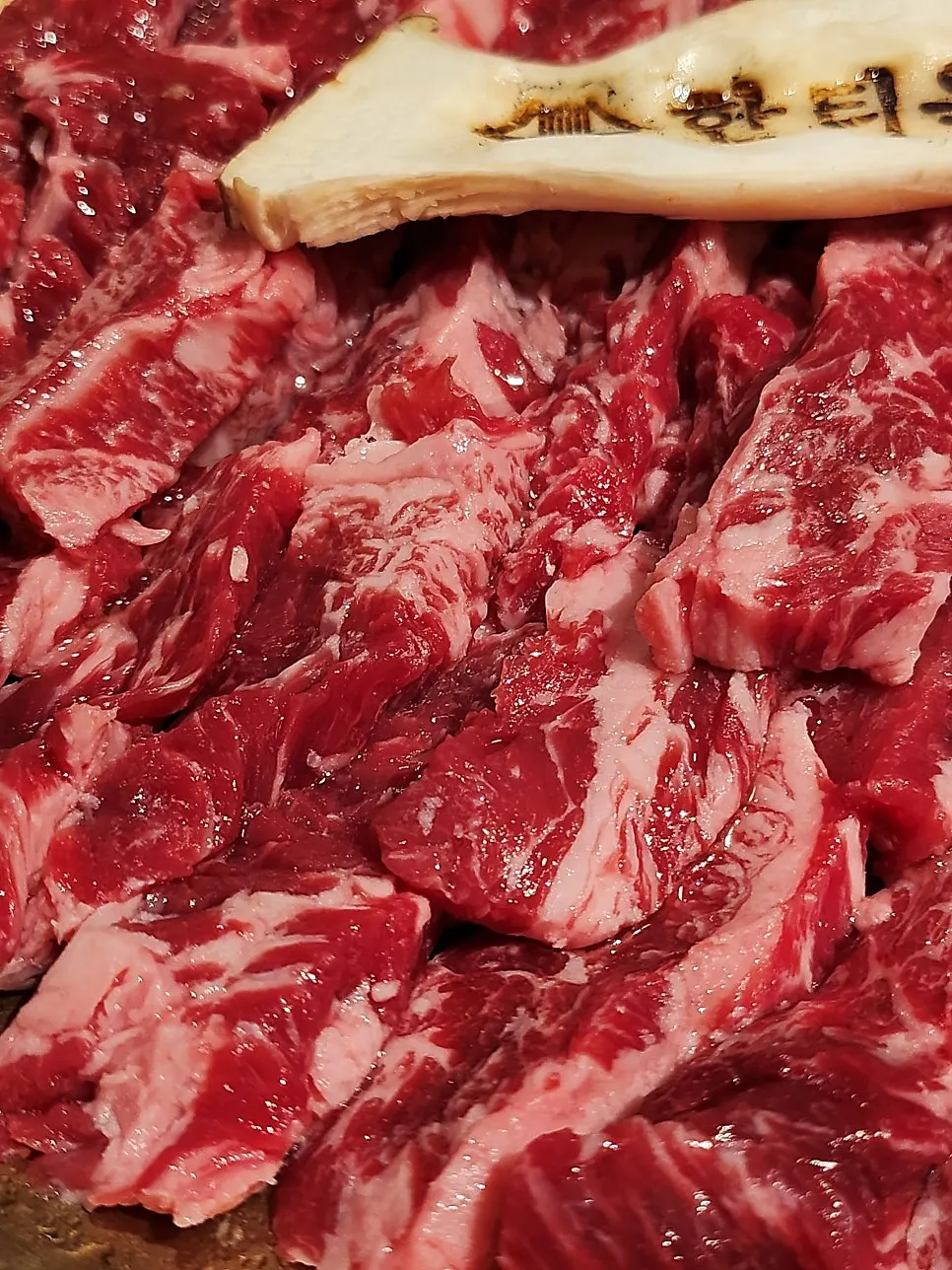 A plate of marbled fresh rib meat
