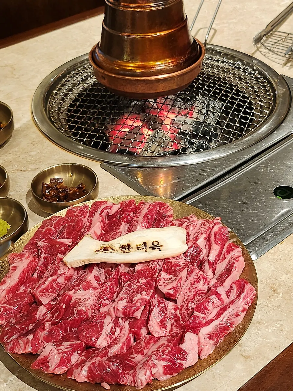 Fresh rib meat placed on the charcoal grill