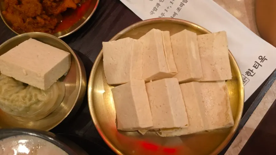 An extra plate of tofu ordered at Hantiok