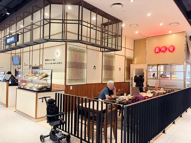 Storefront view with the Hantiok sign visible