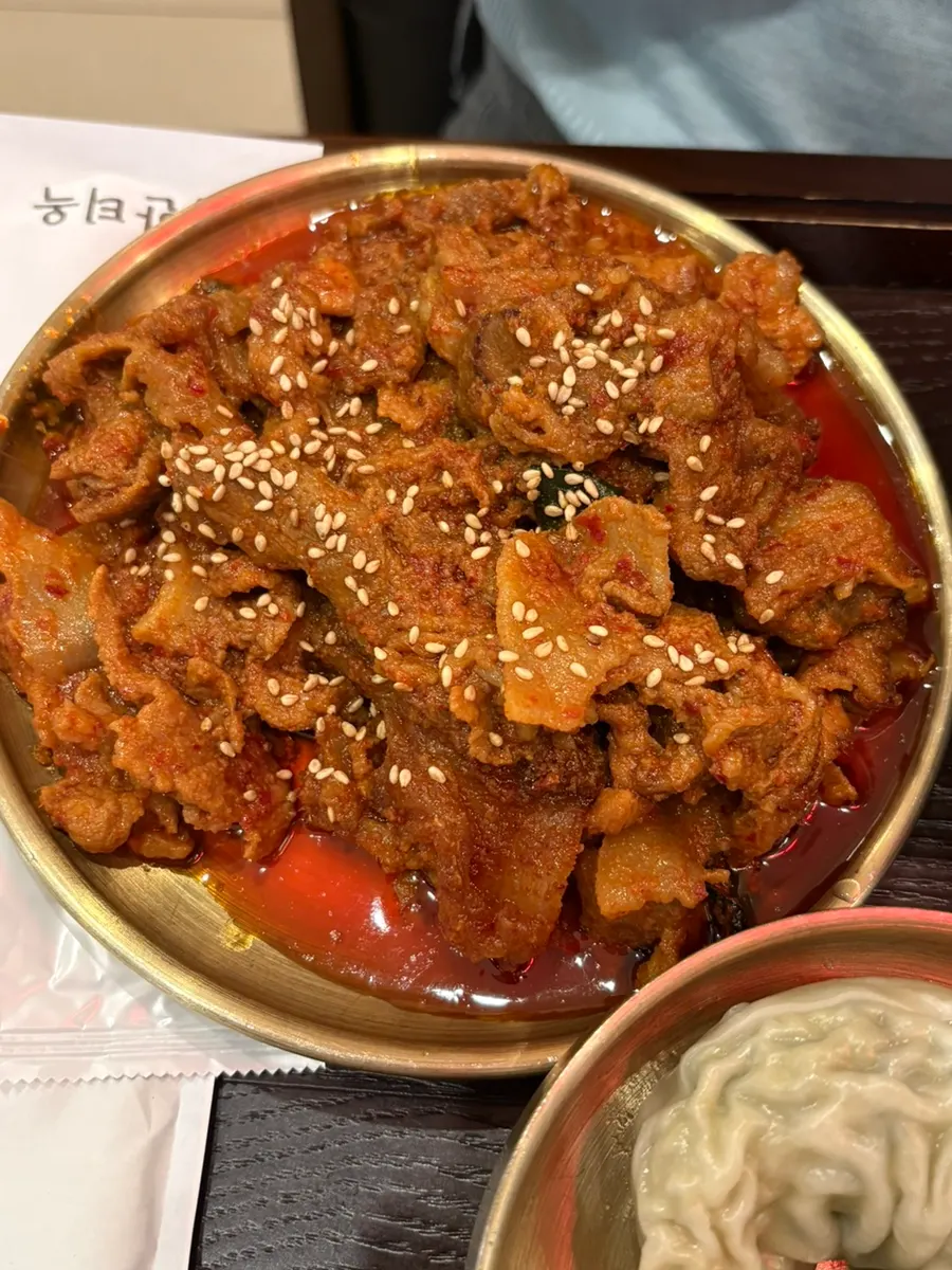 Extra side of jeyuk bokkeum served on a large plate