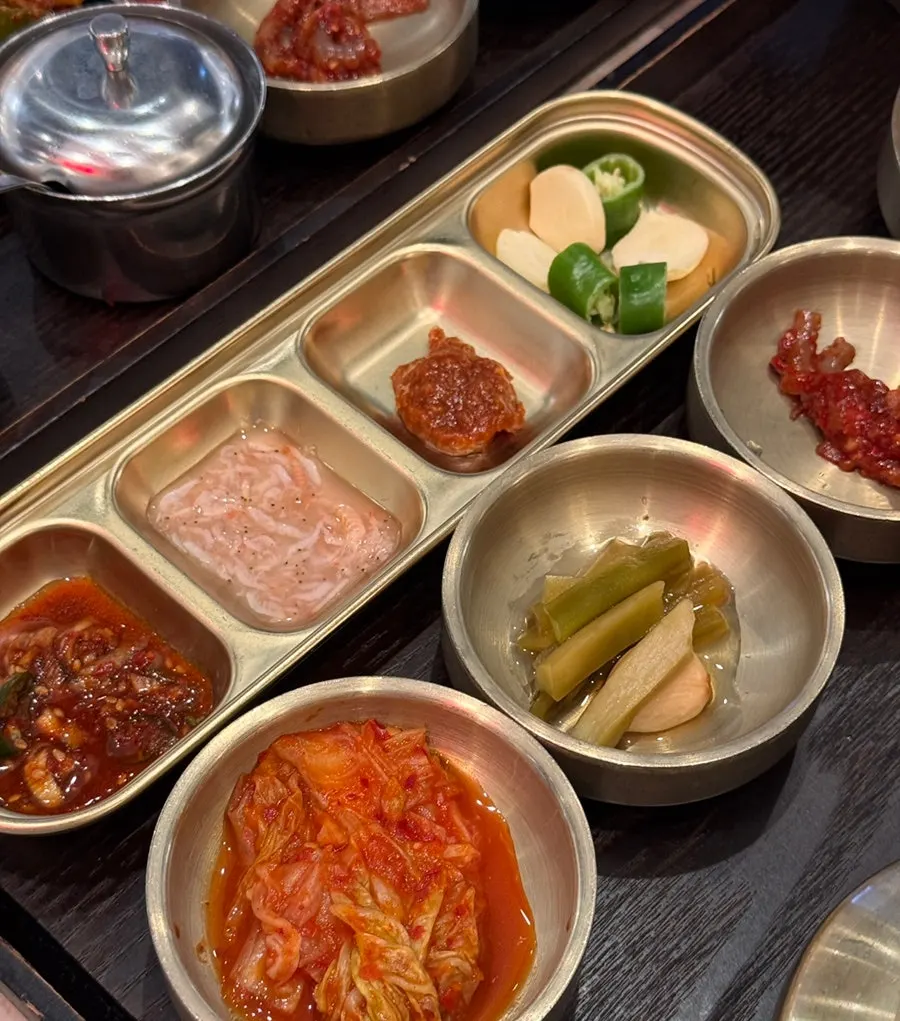 Table spread including 3 dumplings