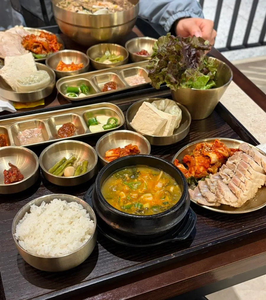 A side plate of tofu and kimchi