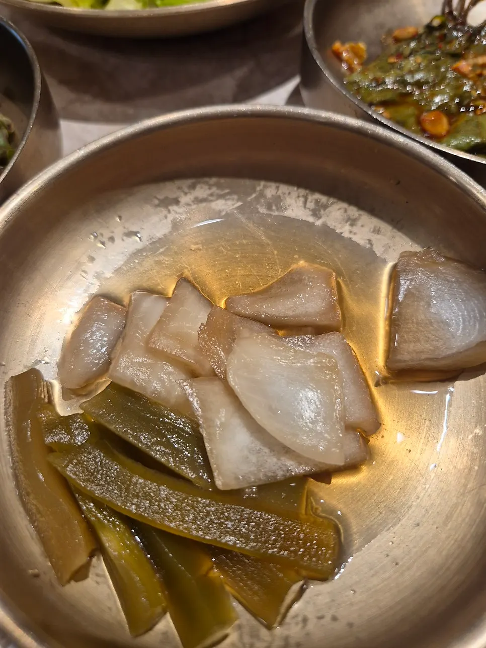 Ice slush floating in naengmyeon broth