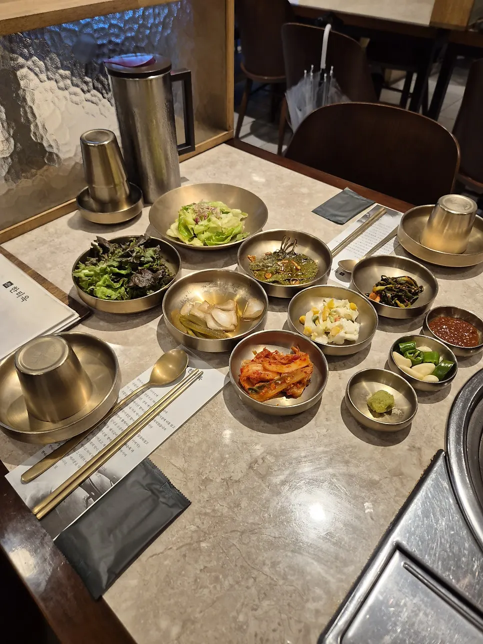 Naengmyeon and galbi together on the table