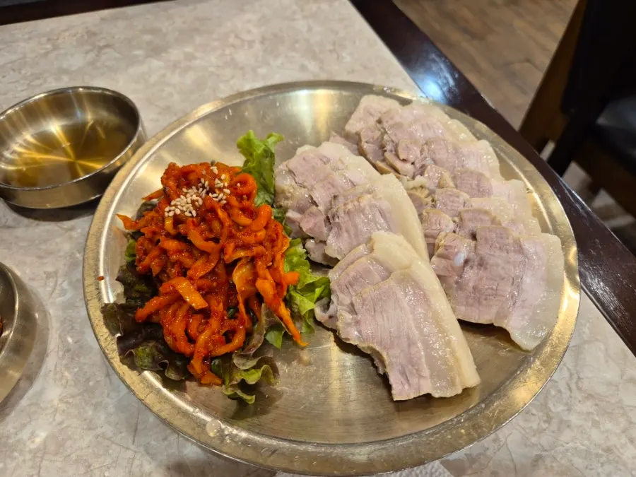 Generous plate of boiled pork meat for two