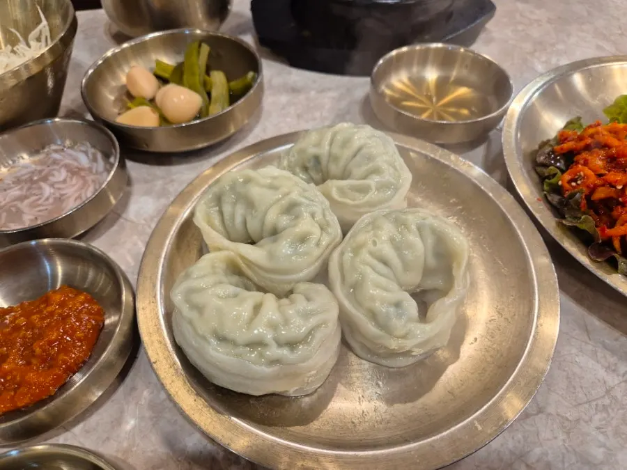 Two dumplings served with the boiled pork set