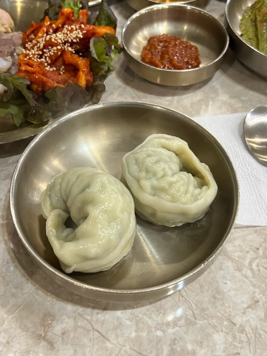 Close-up of Andong guksi broth and noodles