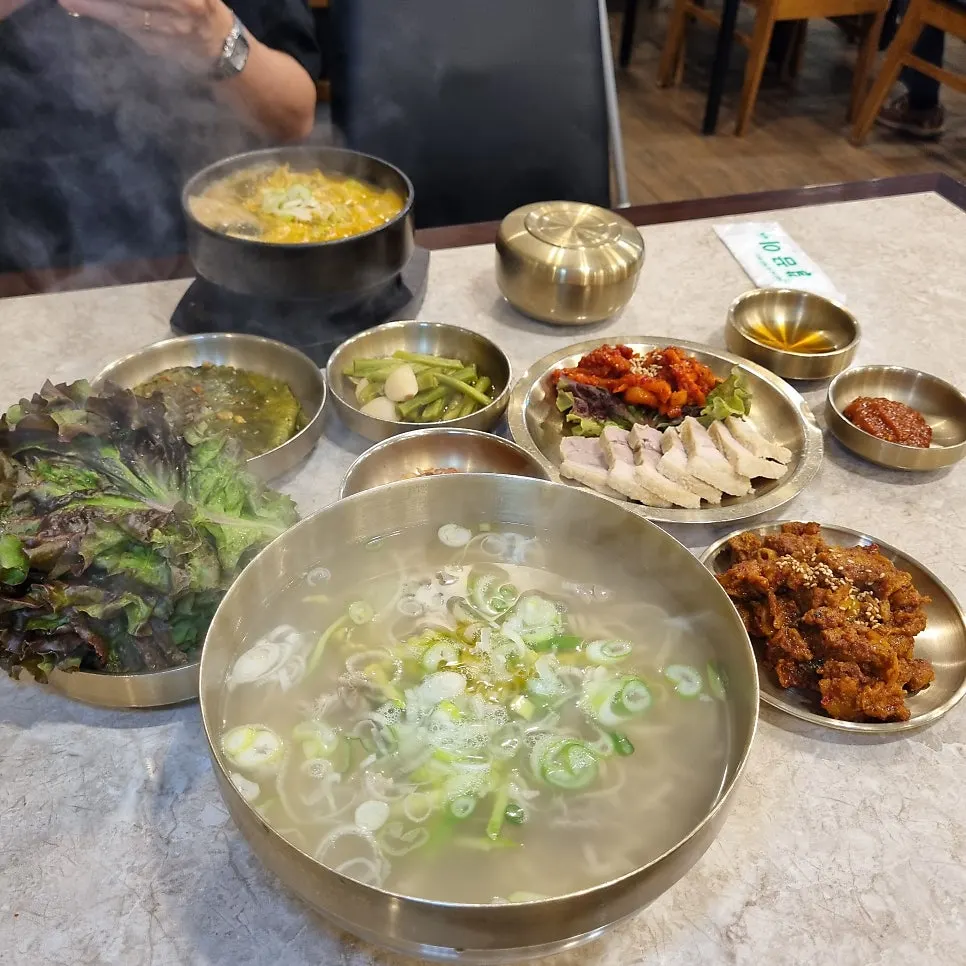 A spoonful of rice mixed into Andong gukbap
