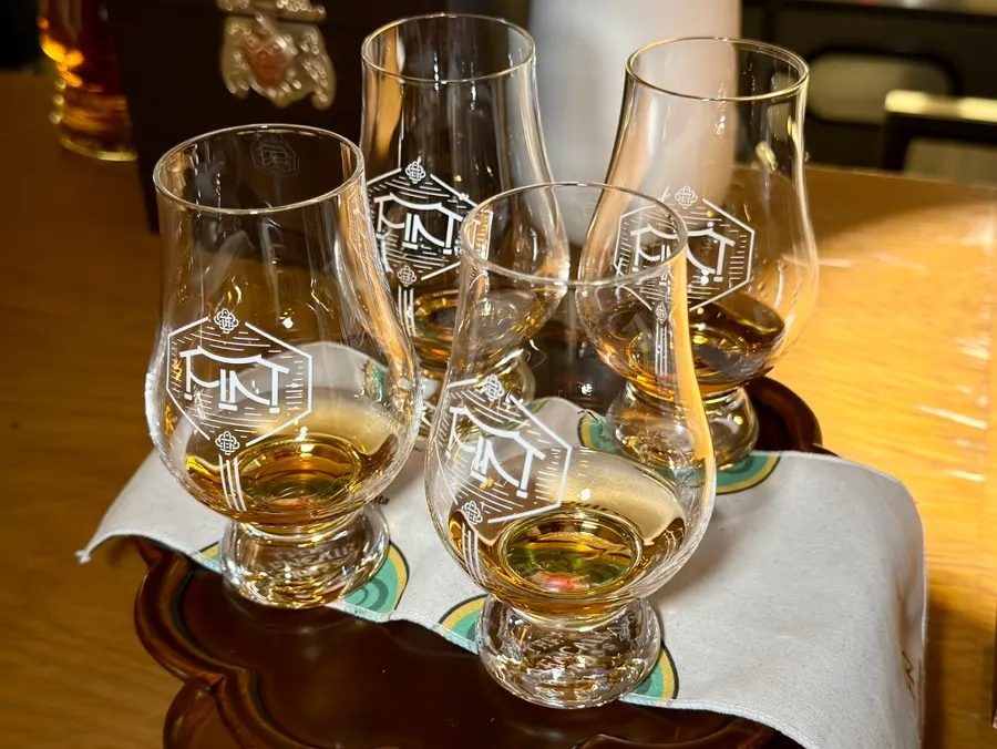 A glass of dessert wine cask-aged Glenmorangie Nectar D'Or