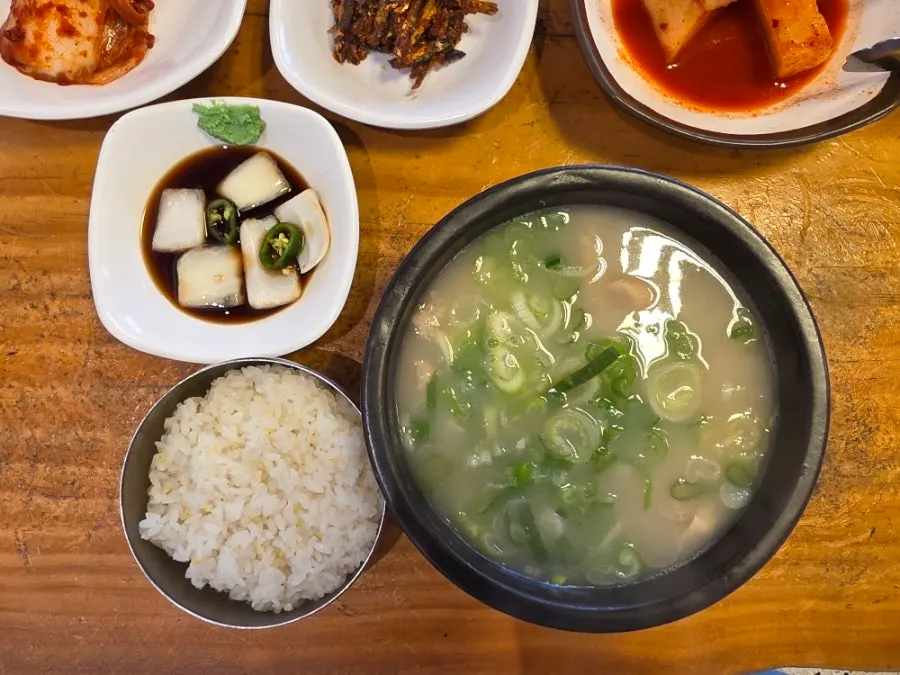 Gukbap served in a stone bowl at Hanwoojang