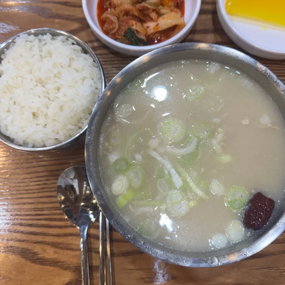 Chicken gomtang with chicken, green onion, glass noodles, and jujube